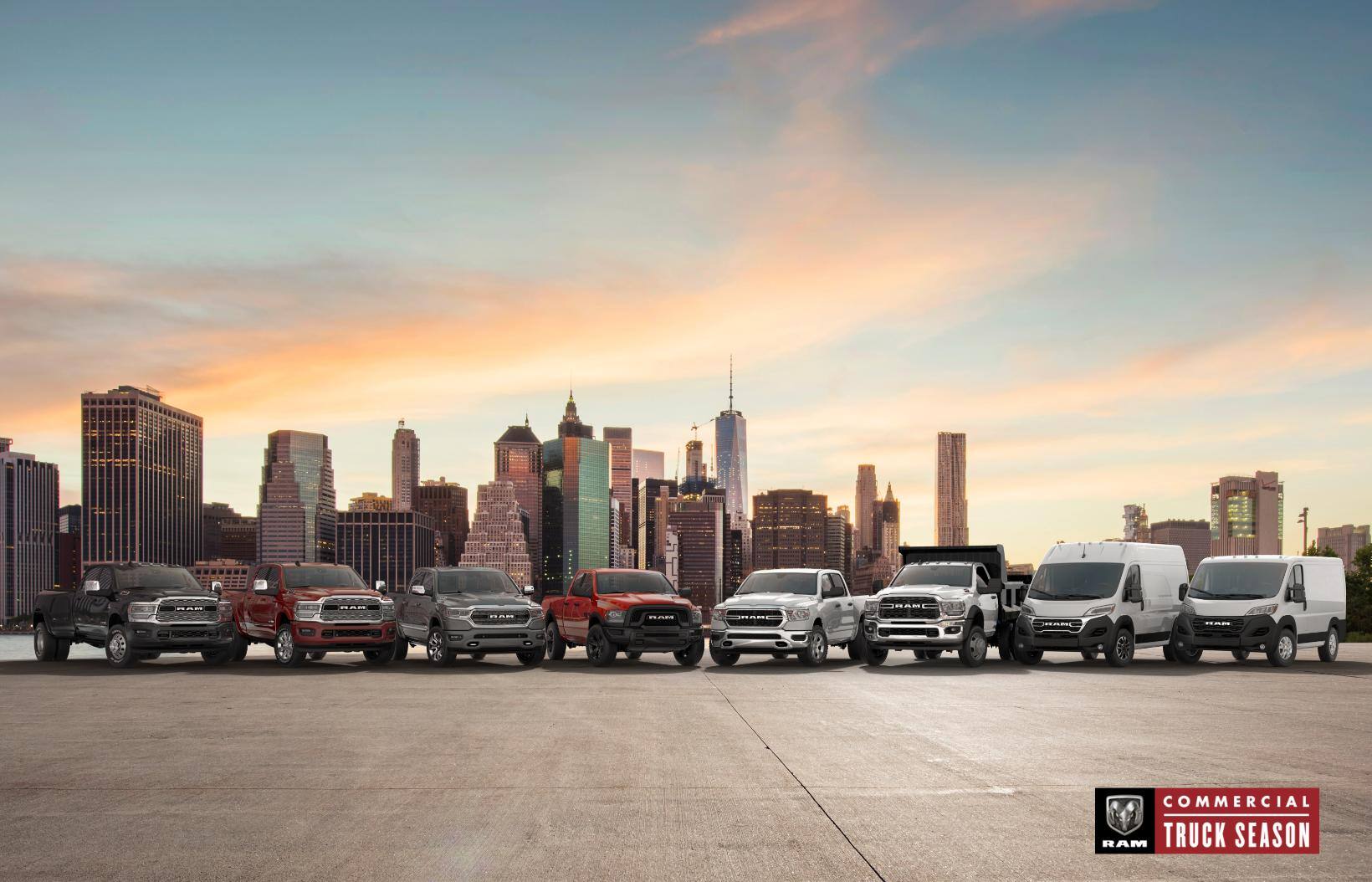 Dodge Ram 1500, 3500, Rebel and Ram Truck Fleet Commercial vehicles all parked parallel to each other in a city parking lot