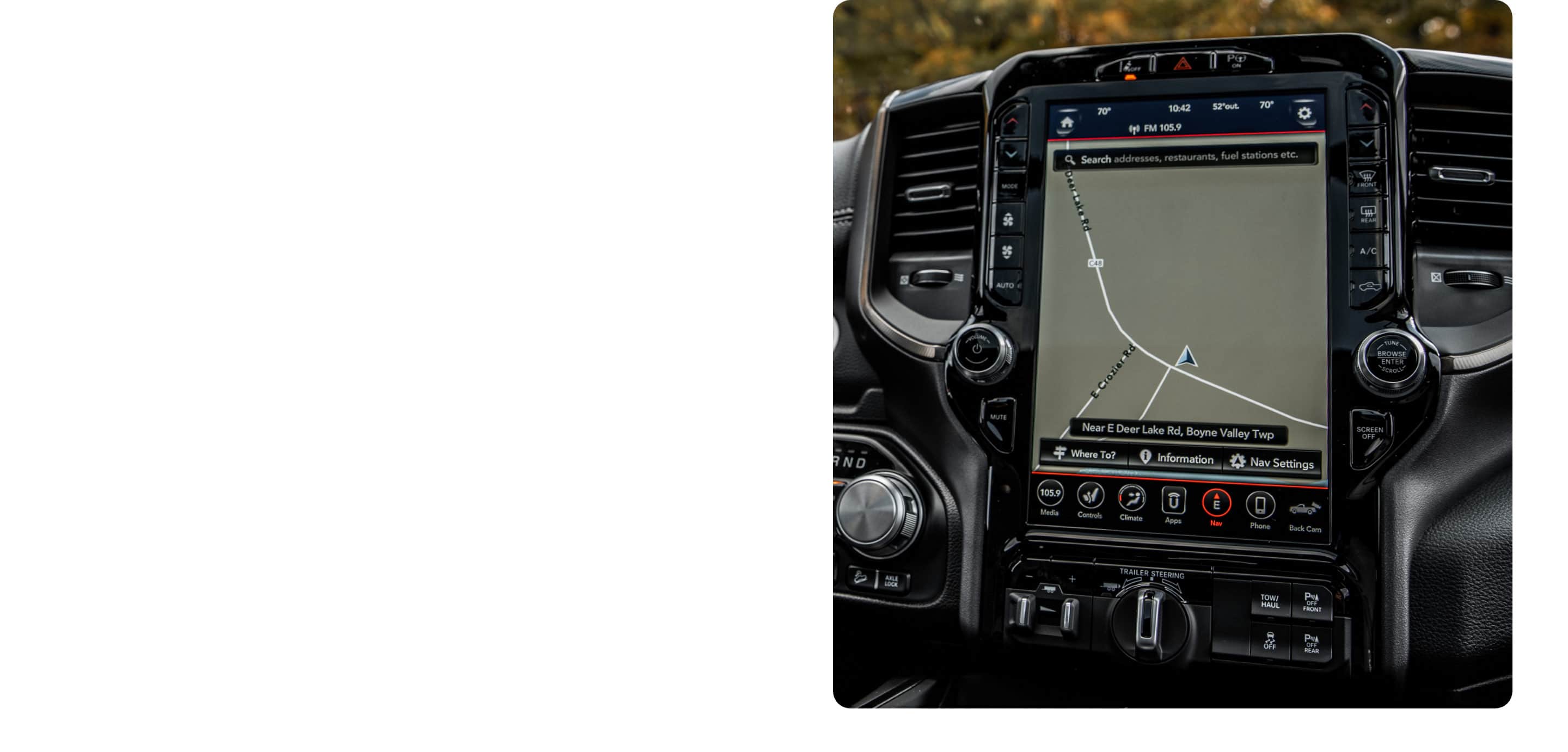 The 12-inch Uconnect touchscreen in the 2021 Ram 1500 with a navigation map displayed onscreen.