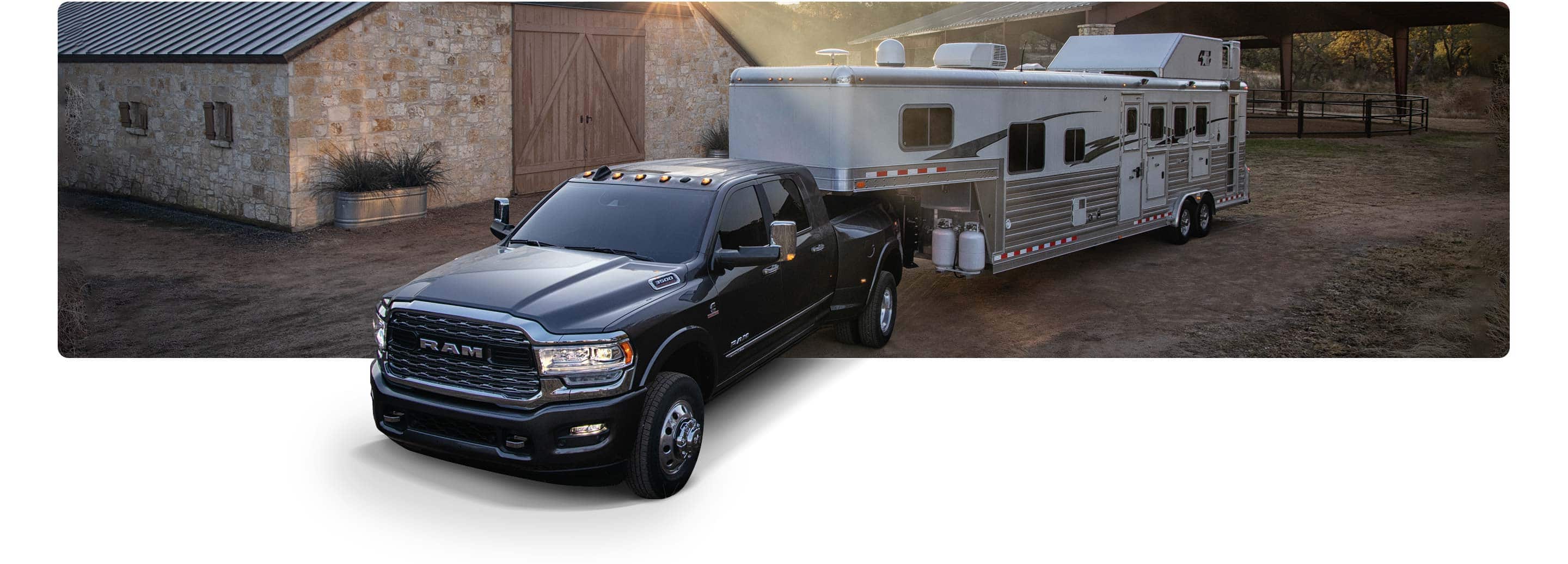 The 2021 Ram 3500 towing a motor home.