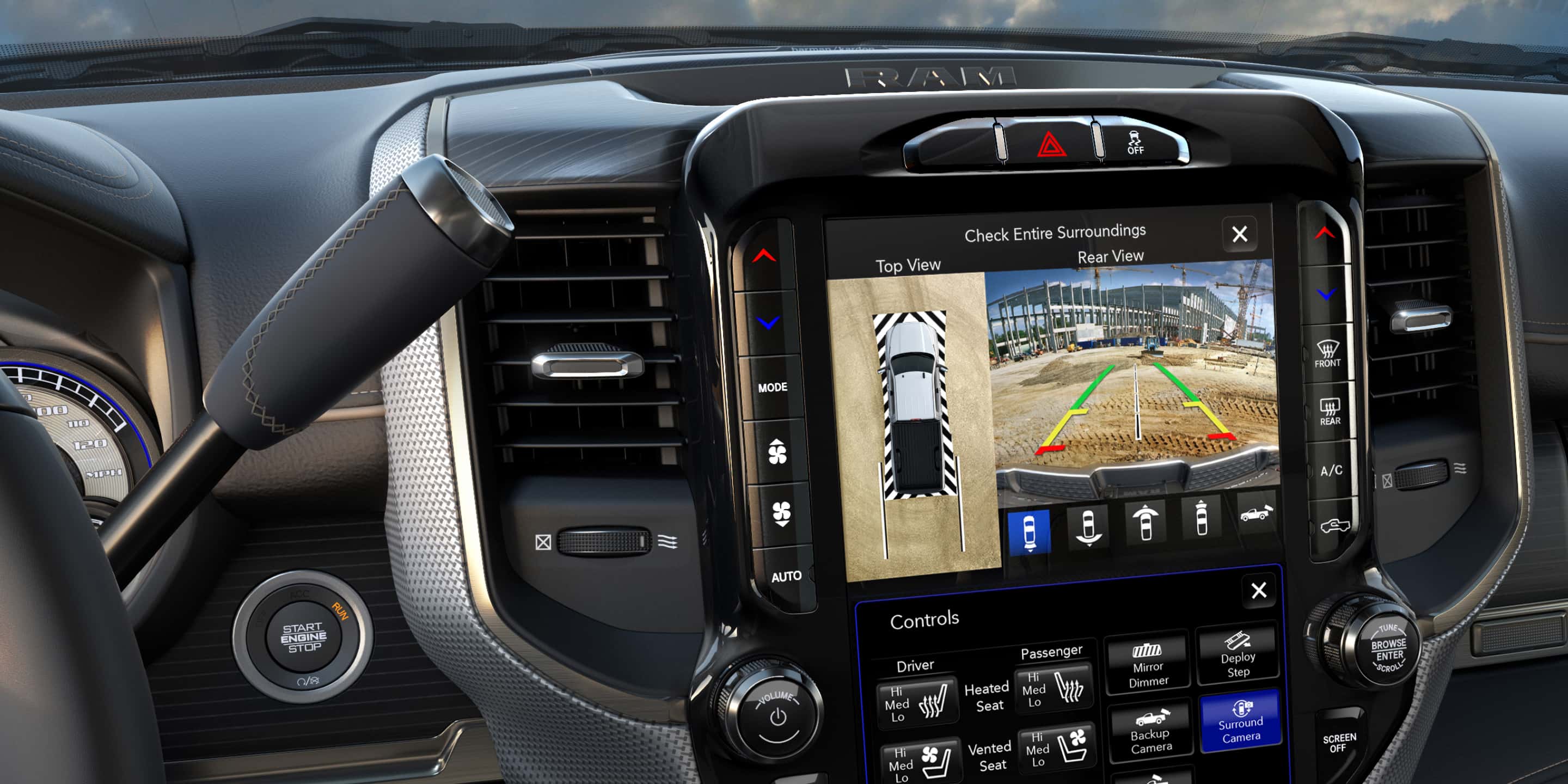 A close-up of the Uconnect touchscreen in the 2021 Ram 2500 displaying the vehicle from above and the area behind the vehicle courtesy of the surround view camera.