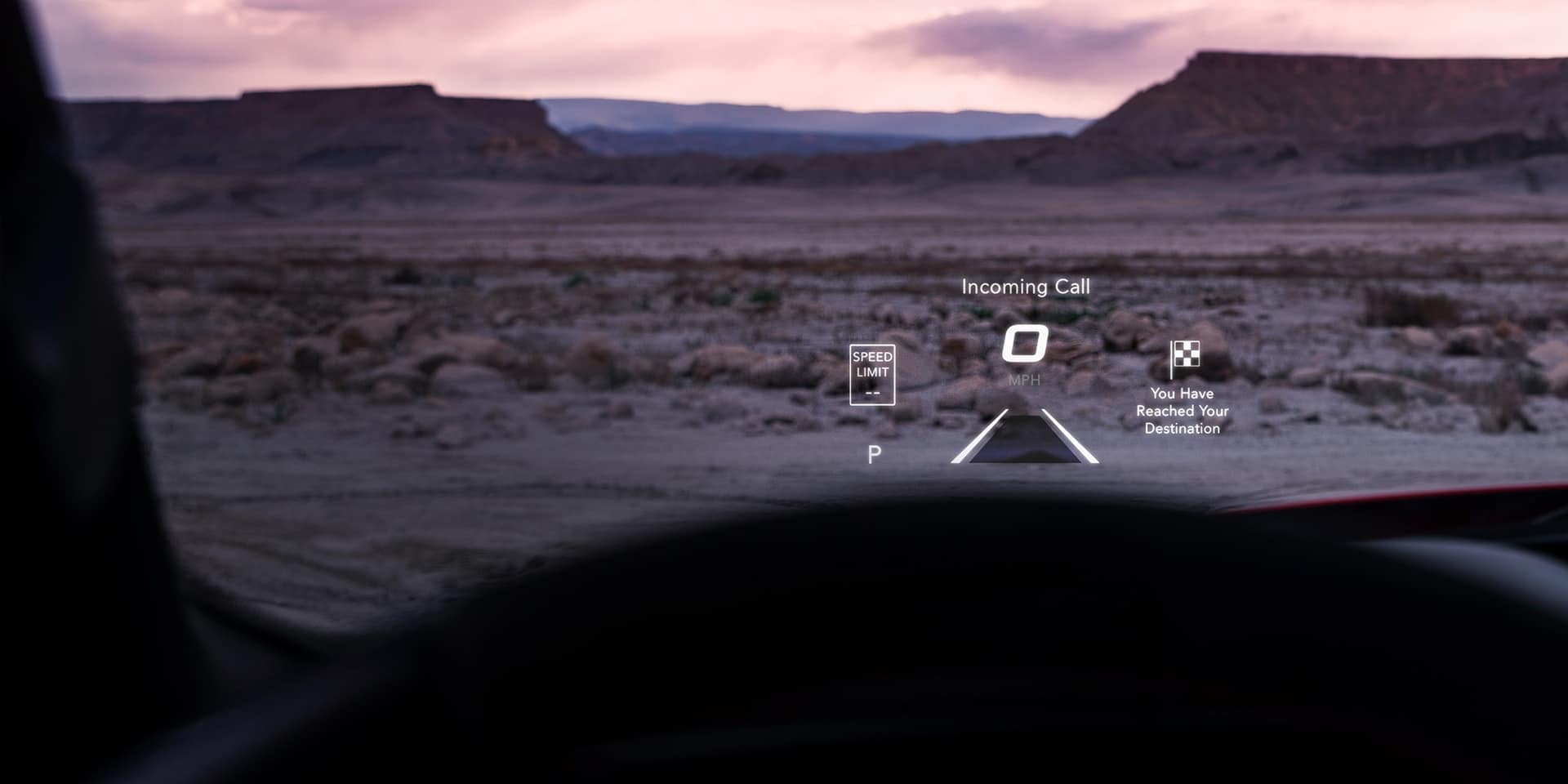 The Head-Up Display on the windshield of the 2021 Ram 1500 TRX, displaying current speed, speed limit and navigation information.