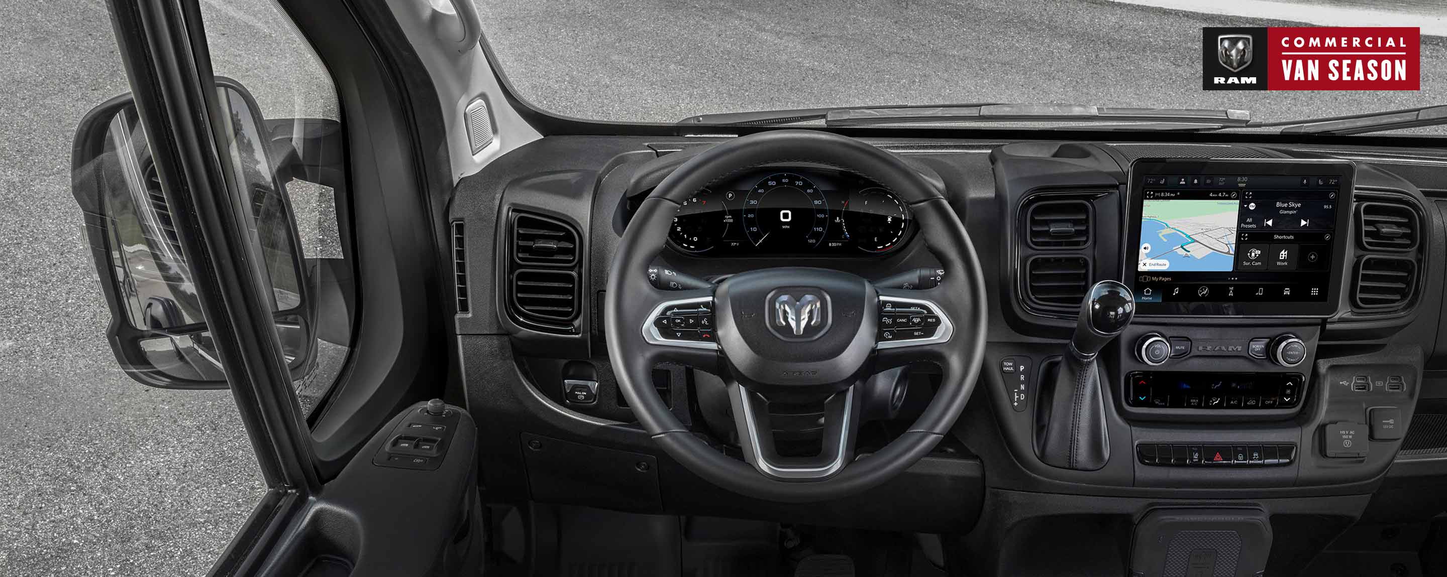 Ram Commercial Van Season. The interior of the 2022 Ram ProMaster, focusing on the steering wheel, climate controls and touchscreen.