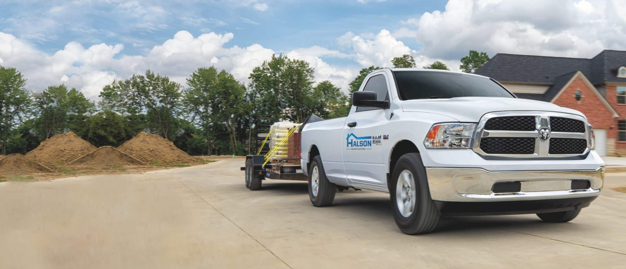 The 2022 Ram 1500 Classic towing a horse trailer.