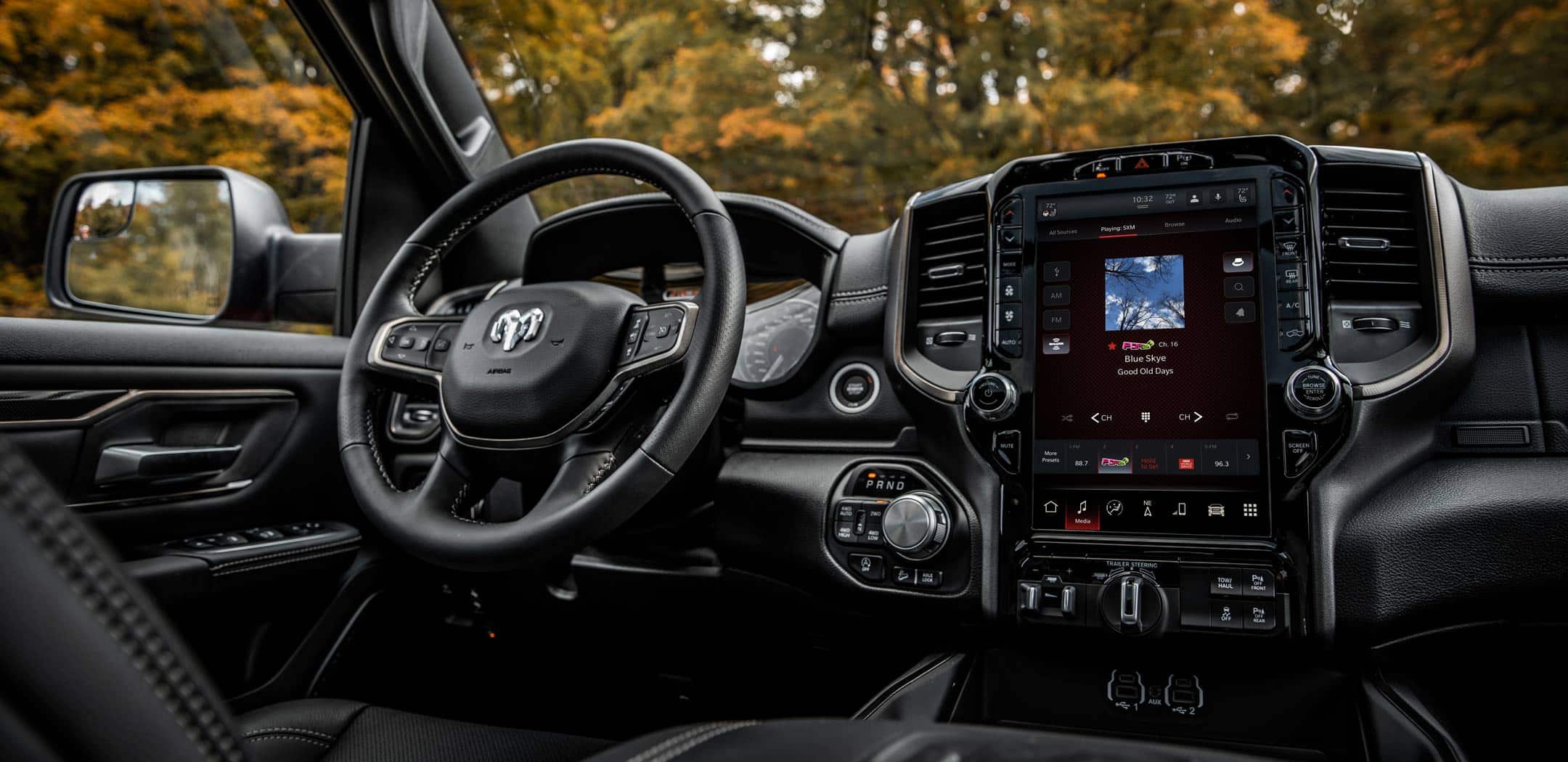 The interior of the 2023 Ram 1500 with the touchscreen displaying a route map.