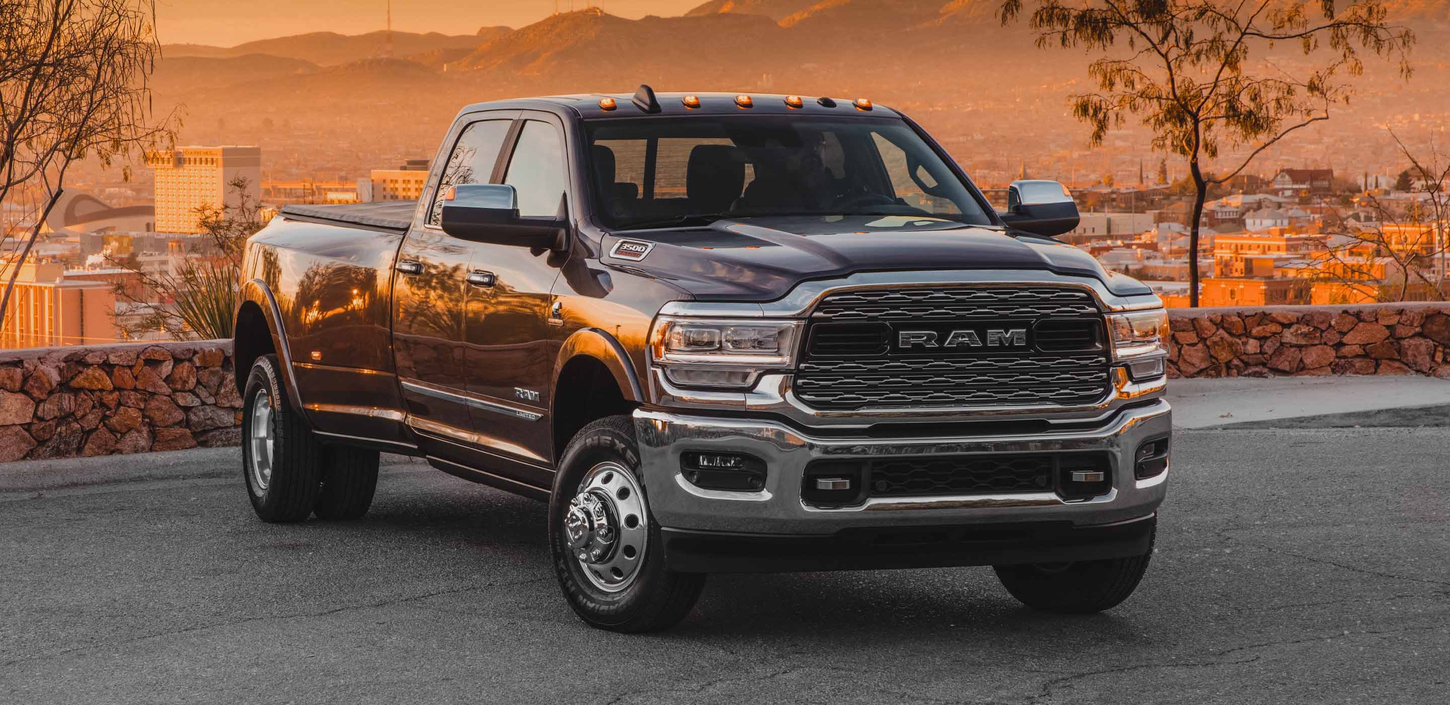 The 2022 Ram 3500 parked at a lookout point at sunset.