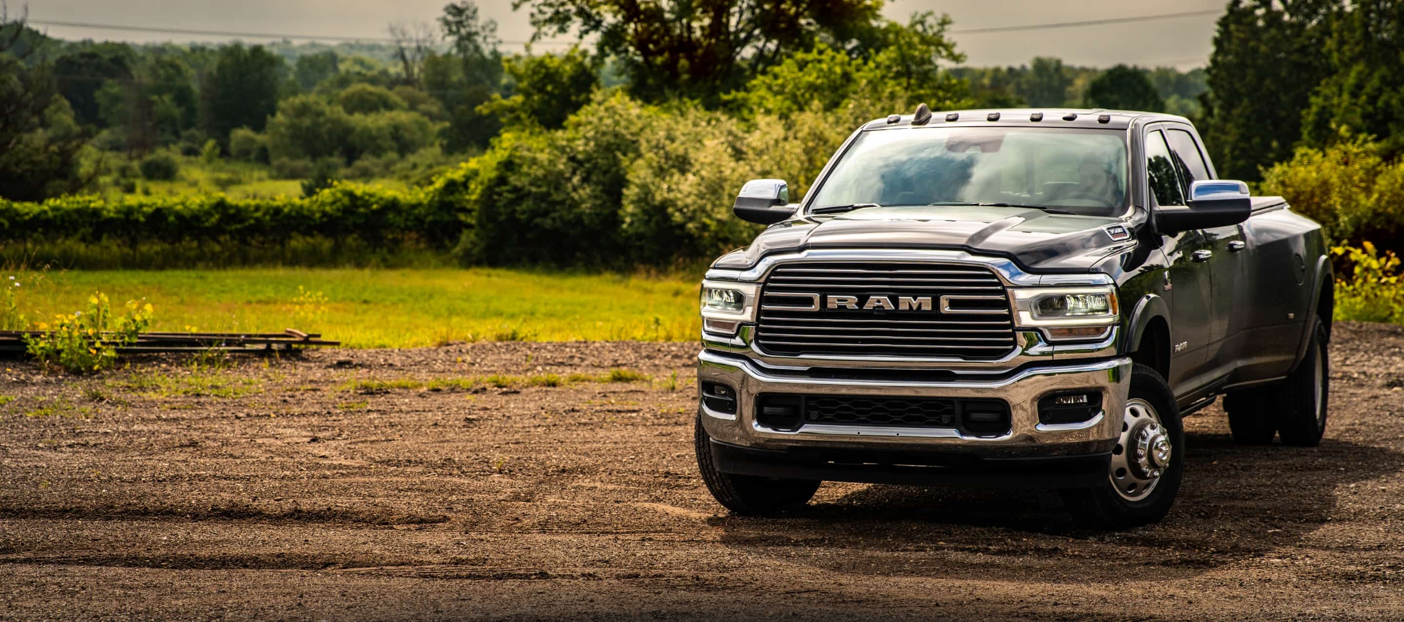 A head-on view of the 2022 Ram 3500 parked on gravel.