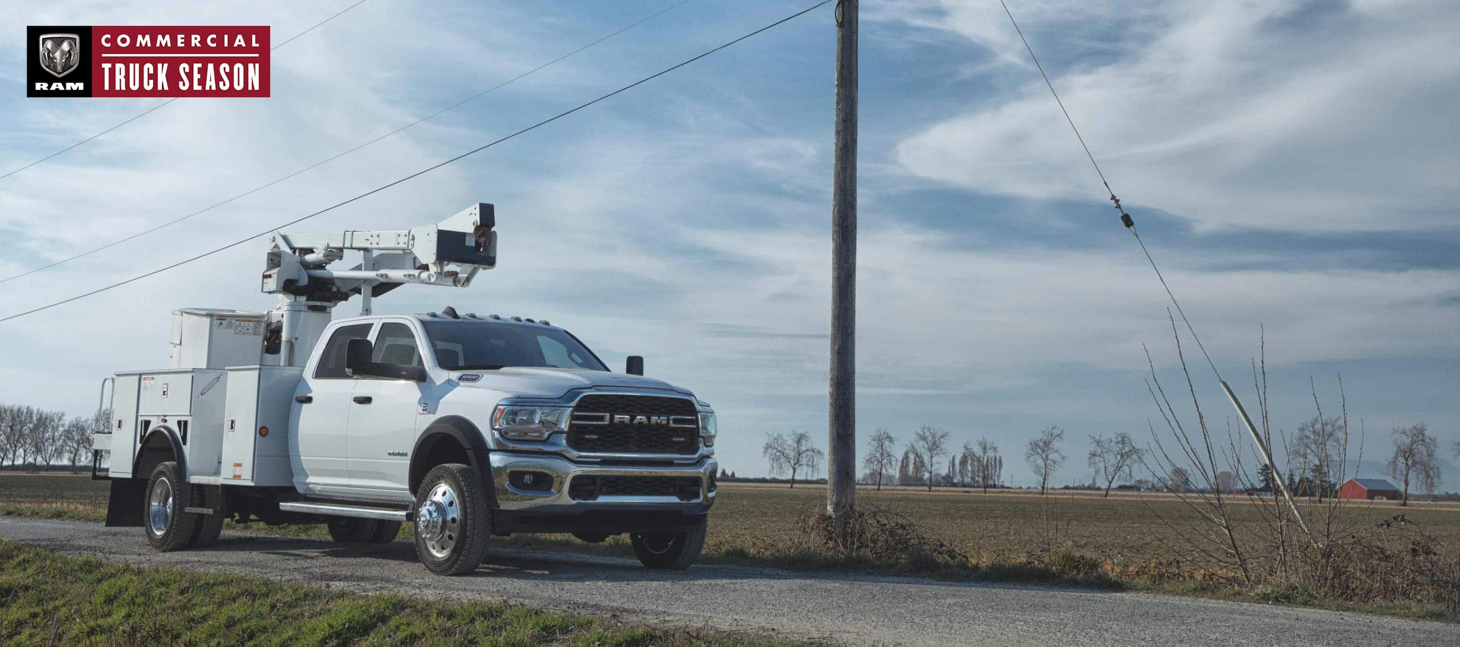 Ram Commercial. A 2022 Ram Chassis Cab with a Service Body Upfit, parked at an open field.
