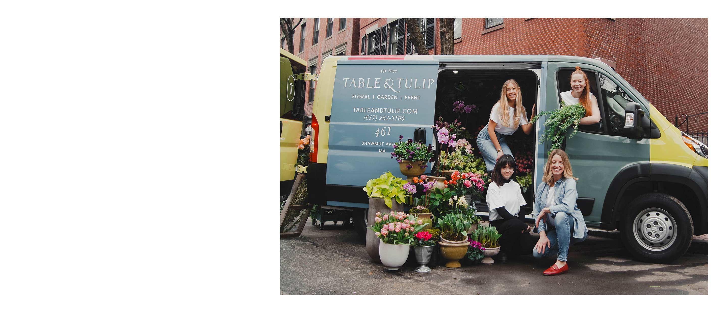 A 2022 Ram ProMaster with a florist logo on the side, packed with potted plants and flower arrangements.