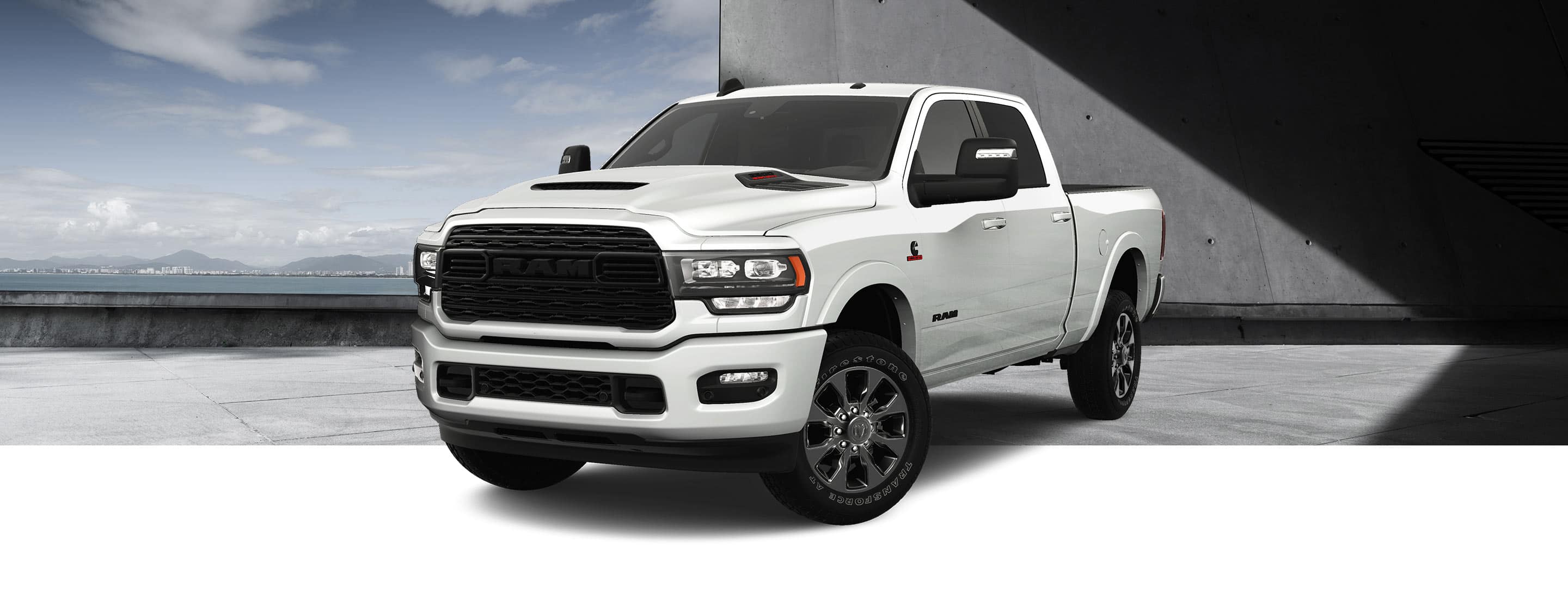 A front angle of a white 2023 Ram 2500 Limited Night Edition Crew Cab.