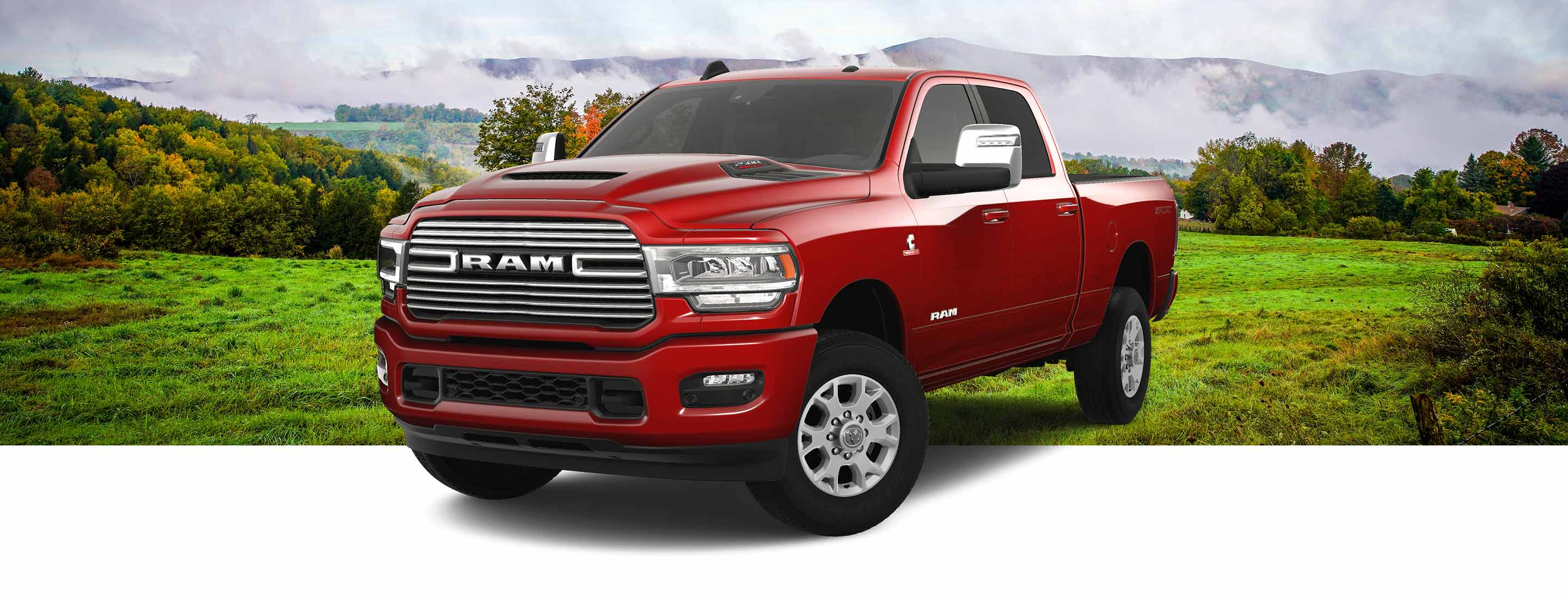 A front angle of a red 2023 Ram 2500 Laramie Crew Cab with the Sport Appearance Package.