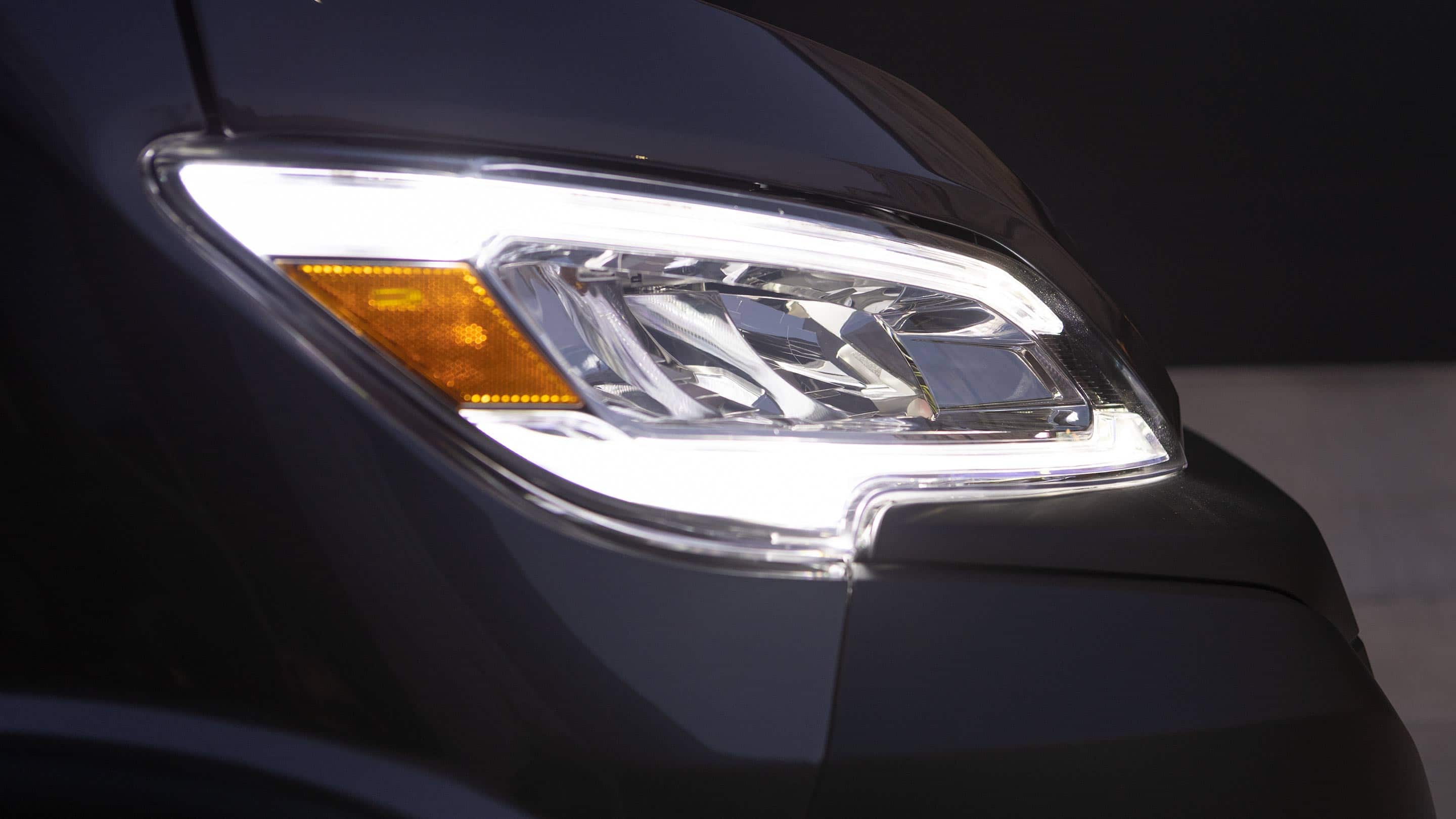 Display A close-up of the passenger-side headlamp on the 2023 Ram ProMaster.