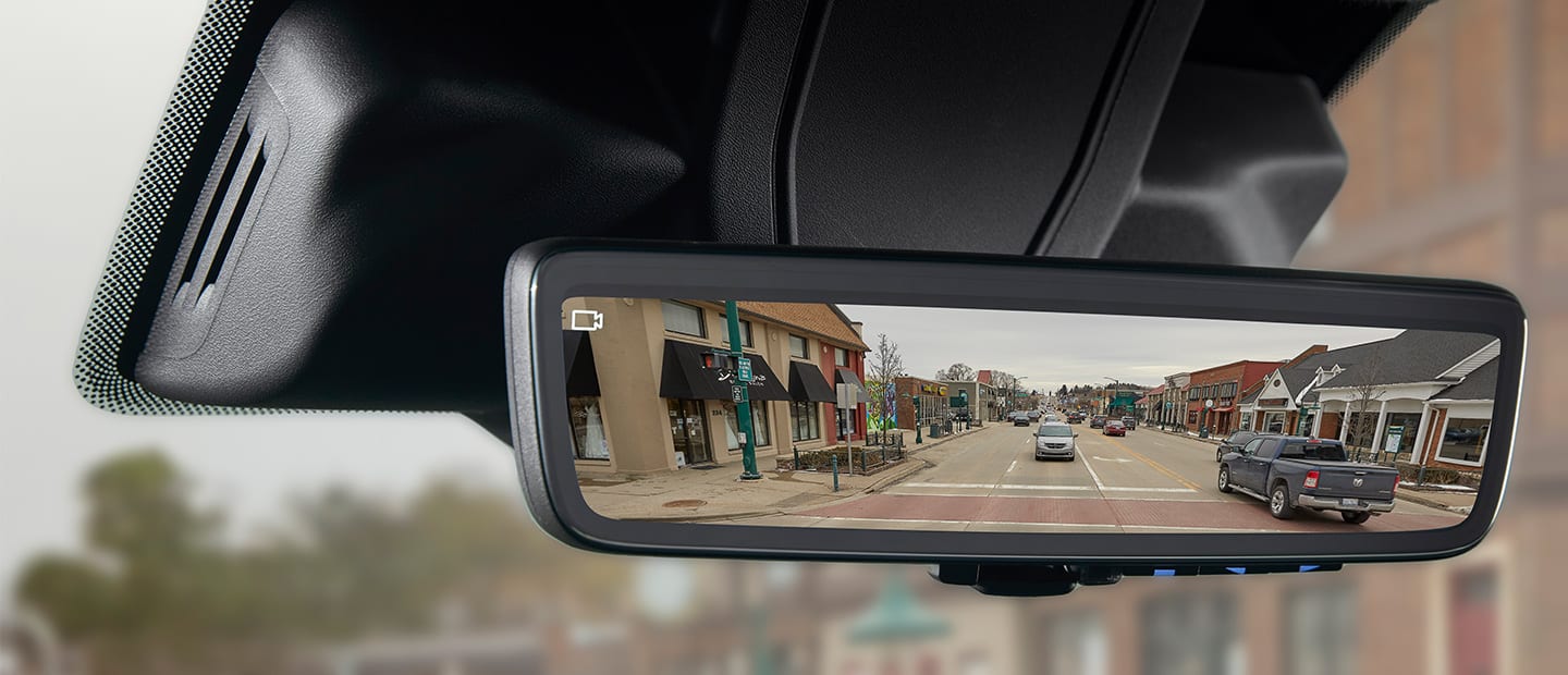 The Digital Rearview Mirror in the 2023 Ram ProMaster with a video camera icon in the corner of the mirror to indicate that the camera is on.