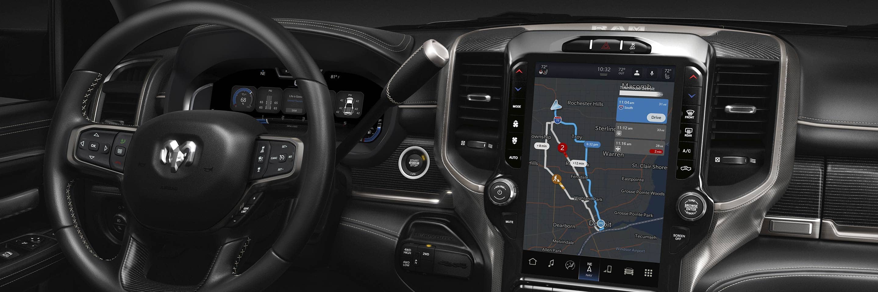 The steering wheel and Uconnect touchscreen in the 2024 Ram 3500 Limited, with the screen displaying a navigation map.