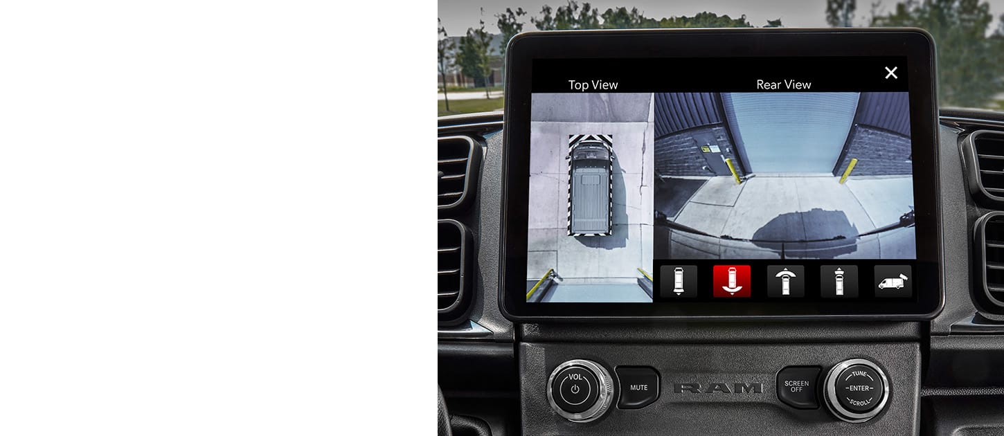 The Uconnect touchscreen in the 2024 Ram ProMaster displaying the output of the 360-degree Surround View Camera and ParkView Rear Back Up Camera.