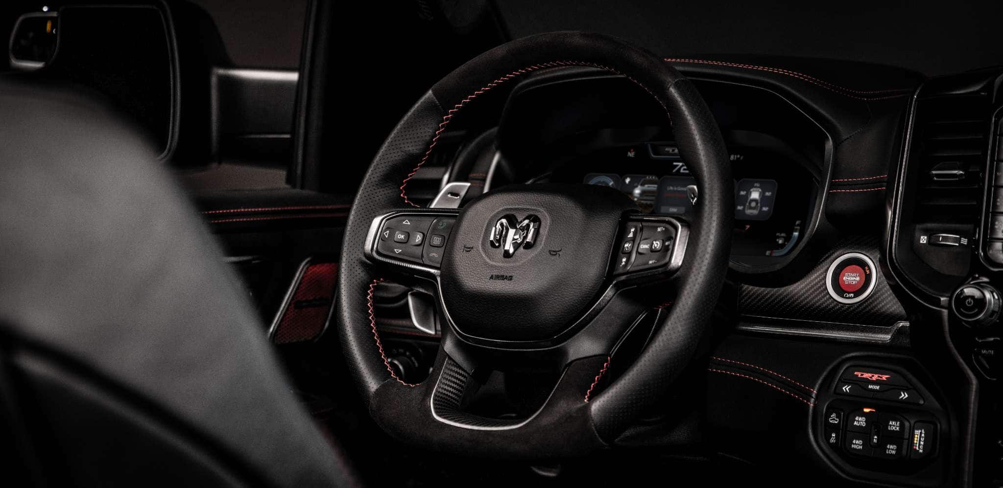 Display A close-up of the steering wheel in the 2024 Ram 1500 TRX.