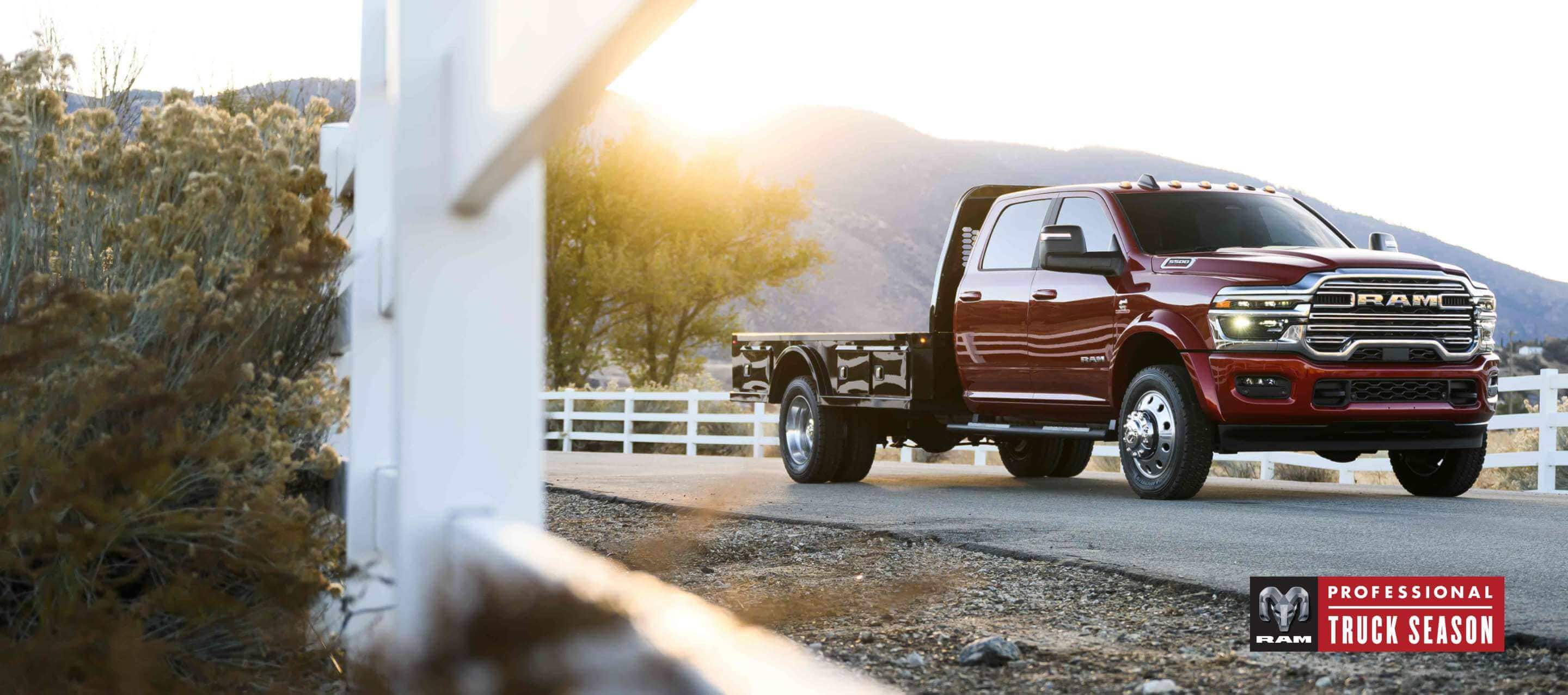 A red 2025 Ram 5500 Laramie Chassis Crew Cab with a long platform upfit. Ram Professional Truck Season.