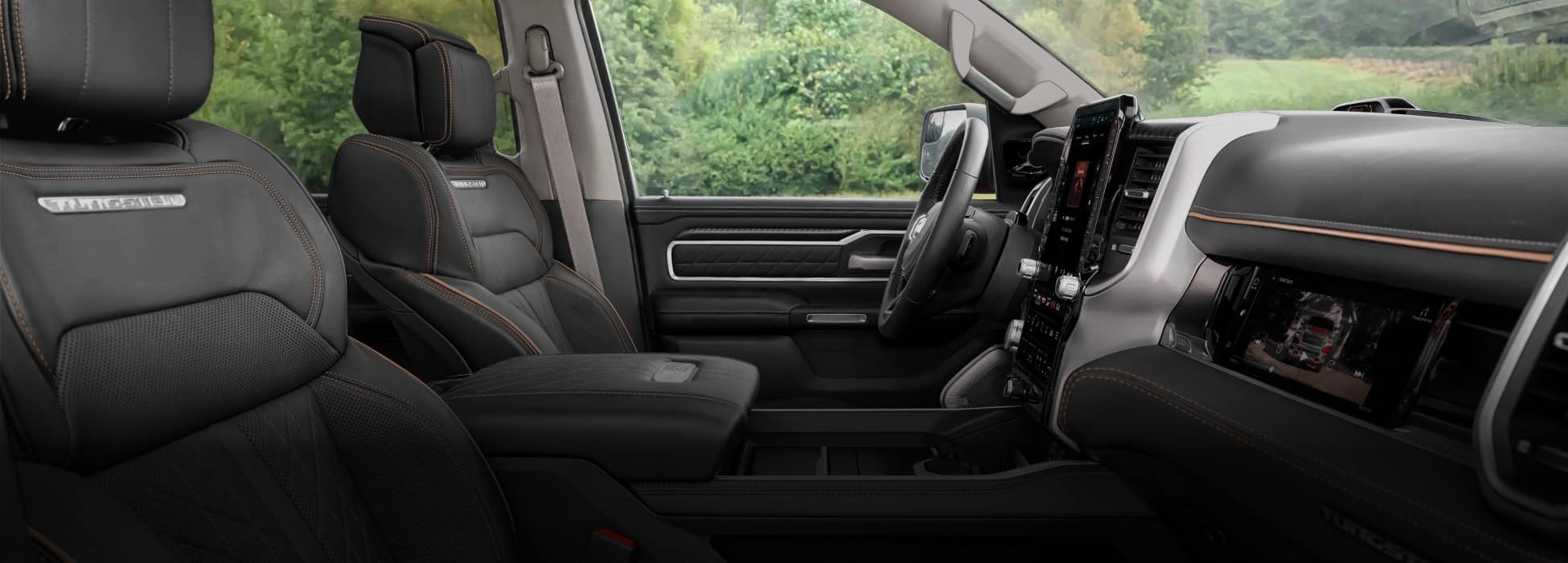 The front seats in the 2026 Ram 1500 Tungsten 4x4 Crew Cab.