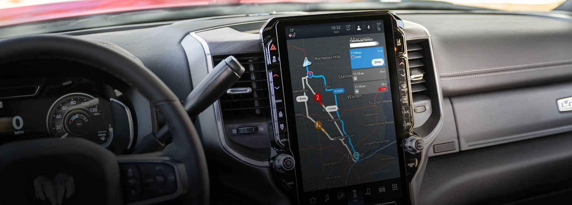 The Uconnect touchscreen in a 2026 Ram 2500 Laramie displaying a navigation map.