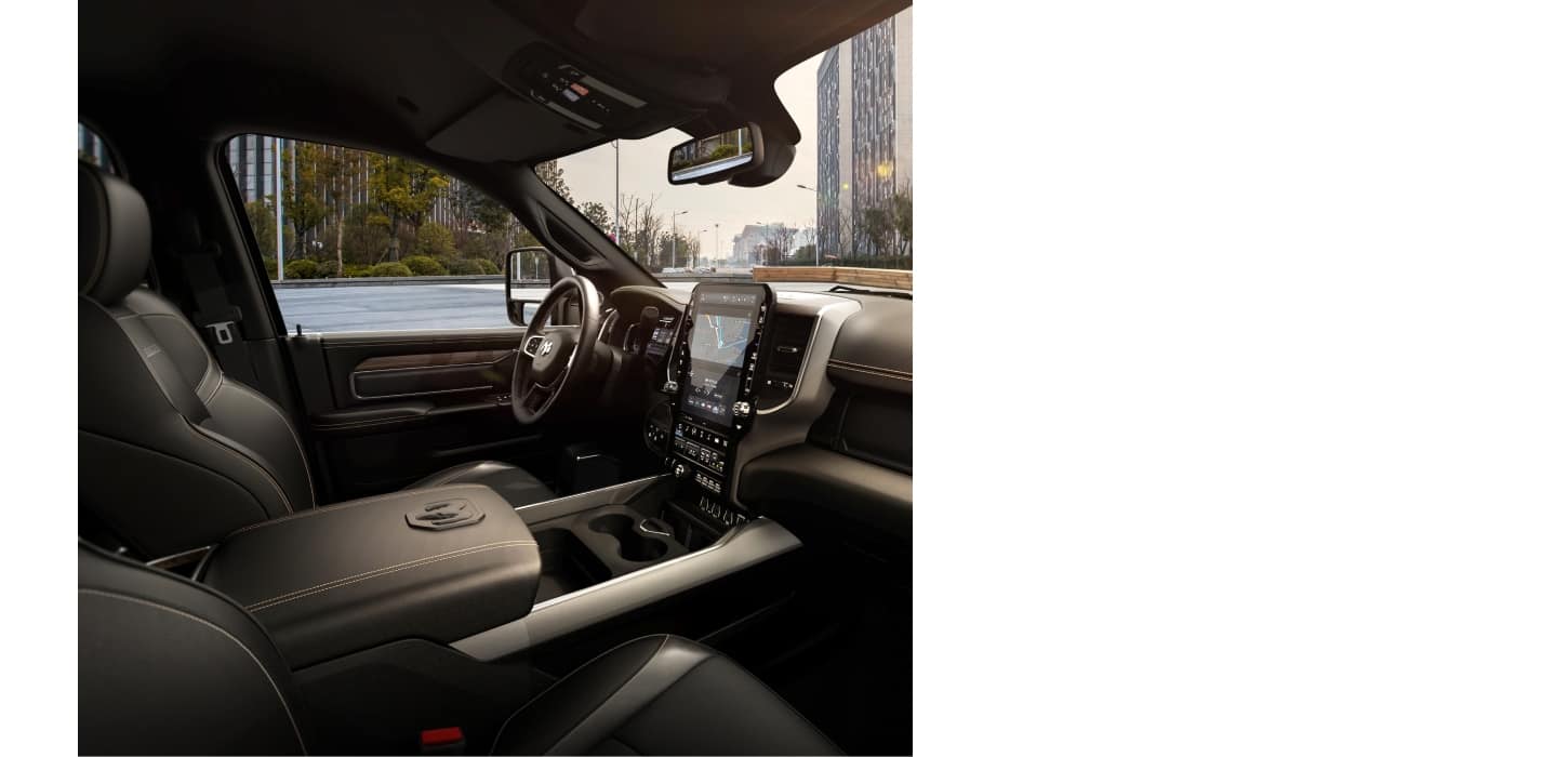 The front seats in a 2026 Ram 3500 Laramie Crew Cab.