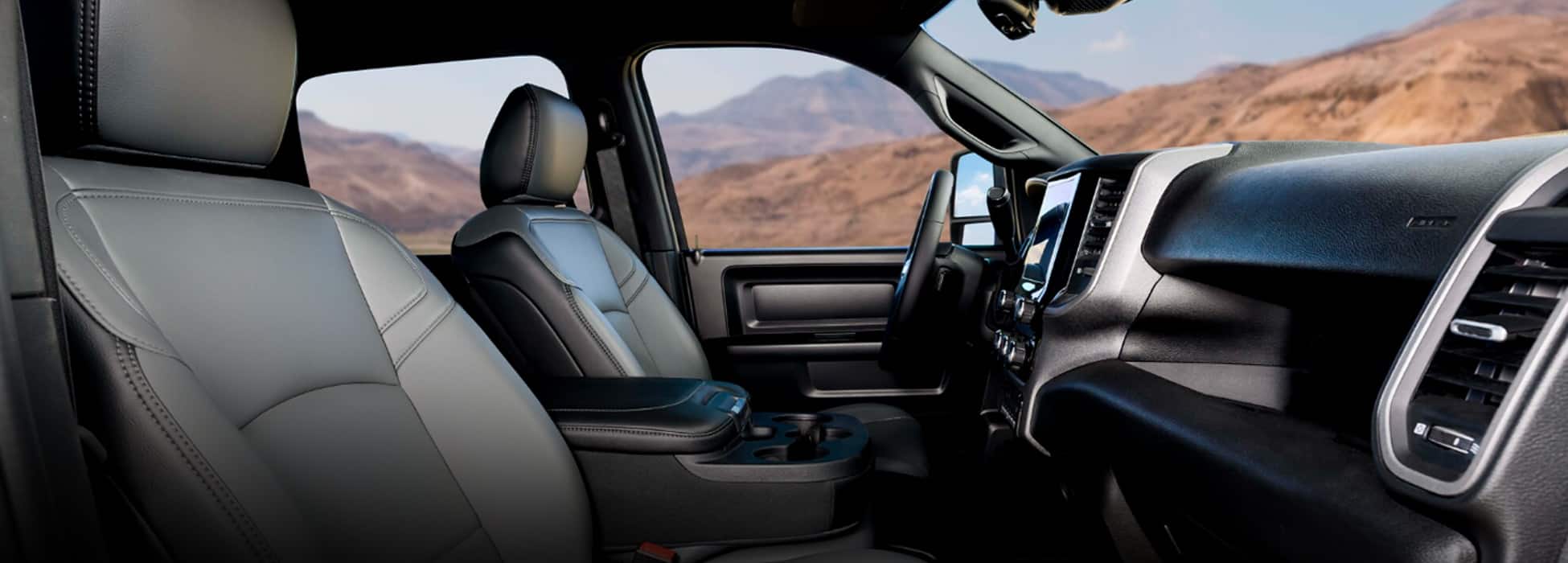 The front seats in a 2026 Ram 3500 Tradesman 4x2 Chassis Cab Crew Cab.