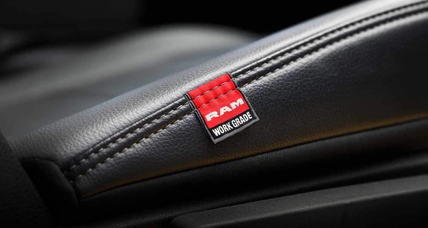 Display The Ram Work Grade tag on the work grade vinyl seats in the 2026 Ram Chassis Cab.