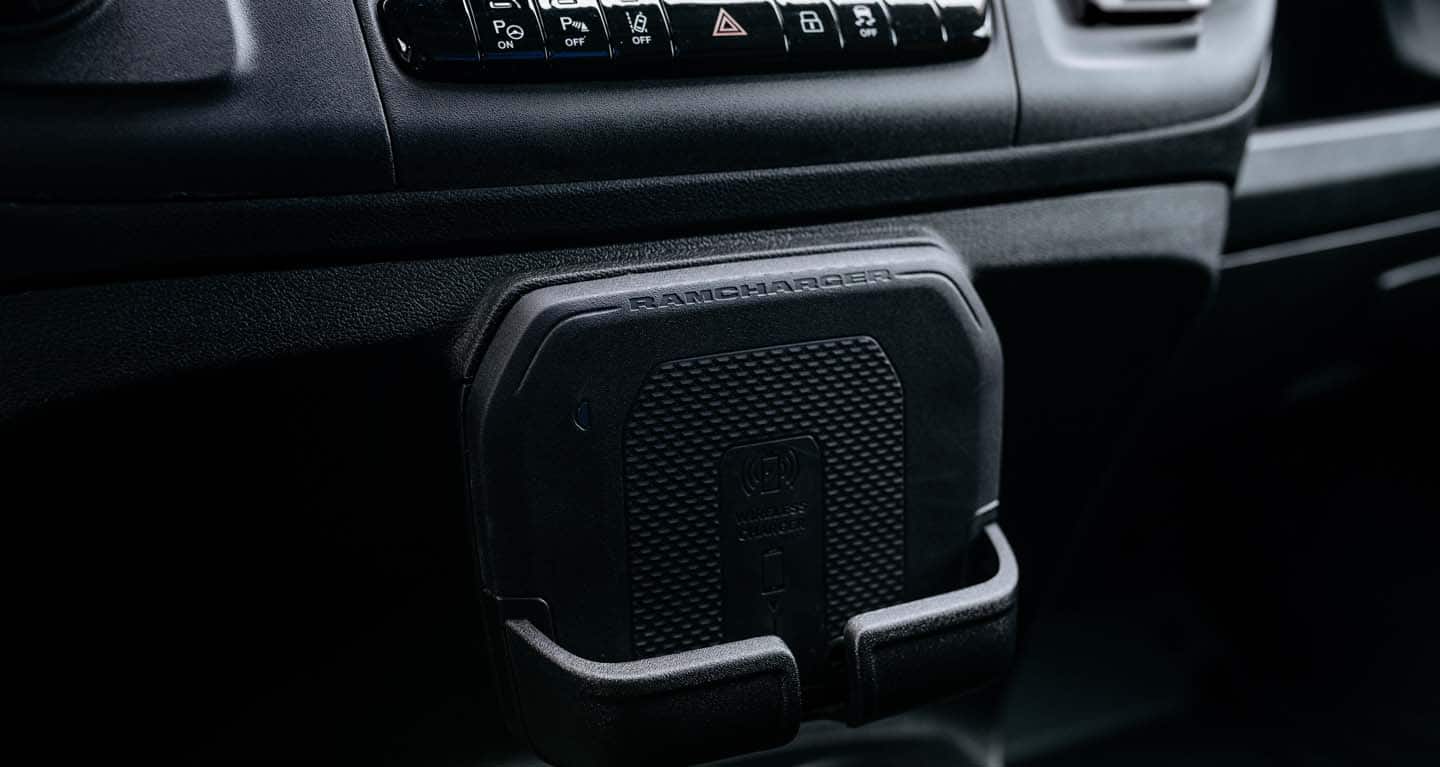 Display The phone shelf with wireless charging system in the 2026 Ram ProMaster EV 3500 Cargo Van.