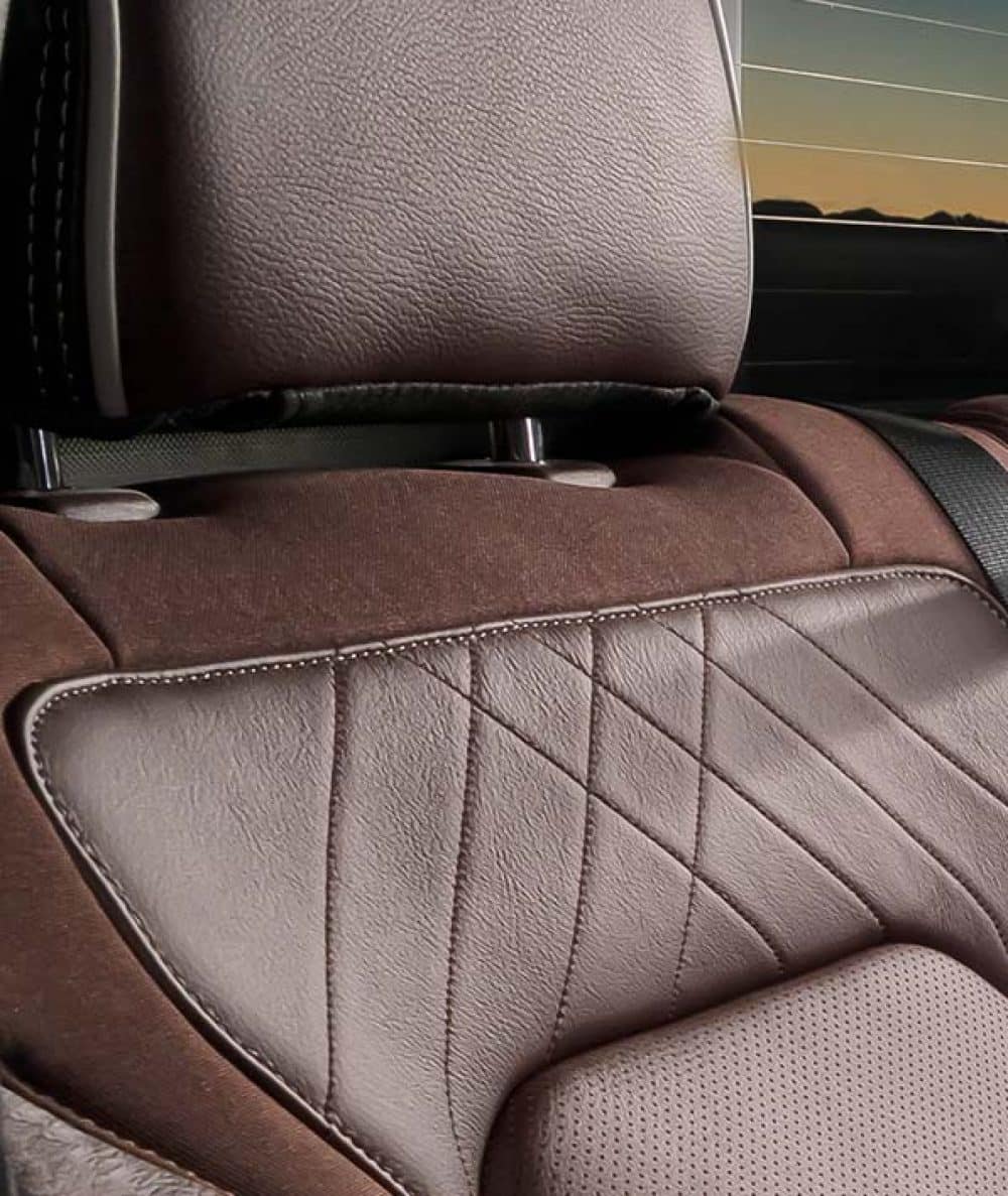 Brown quilted leather front seat in a Ram 1500 REV