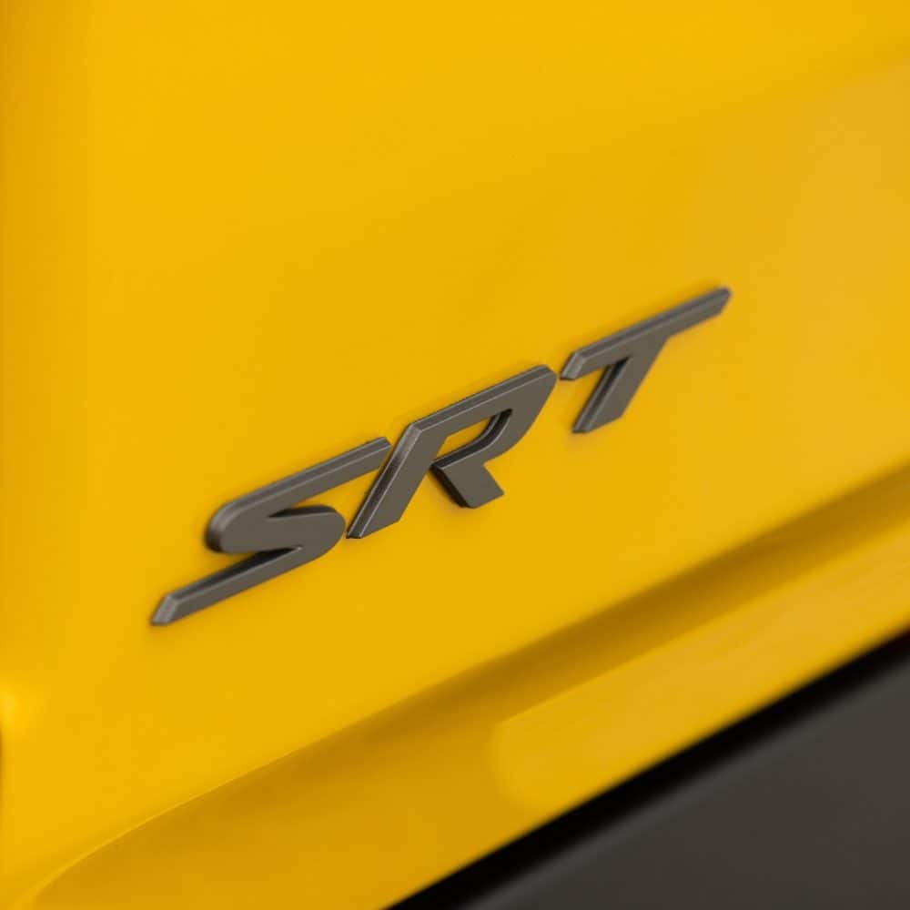 SRT badge on the yellow bodywork of a Ram 1500 Rumble Bee