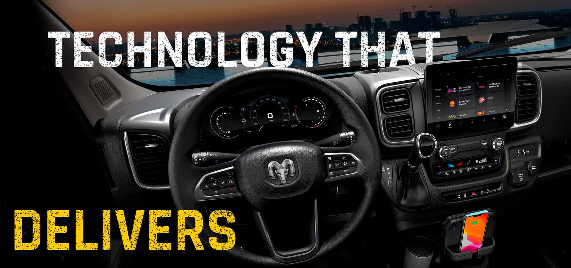The steering wheel, Digital Cluster Display, Uconnect touchscreen, center stack controls, wireless charging shelf and cup holder in the 2027 Ram ProMaster Cargo Van. Technology That Delivers.
