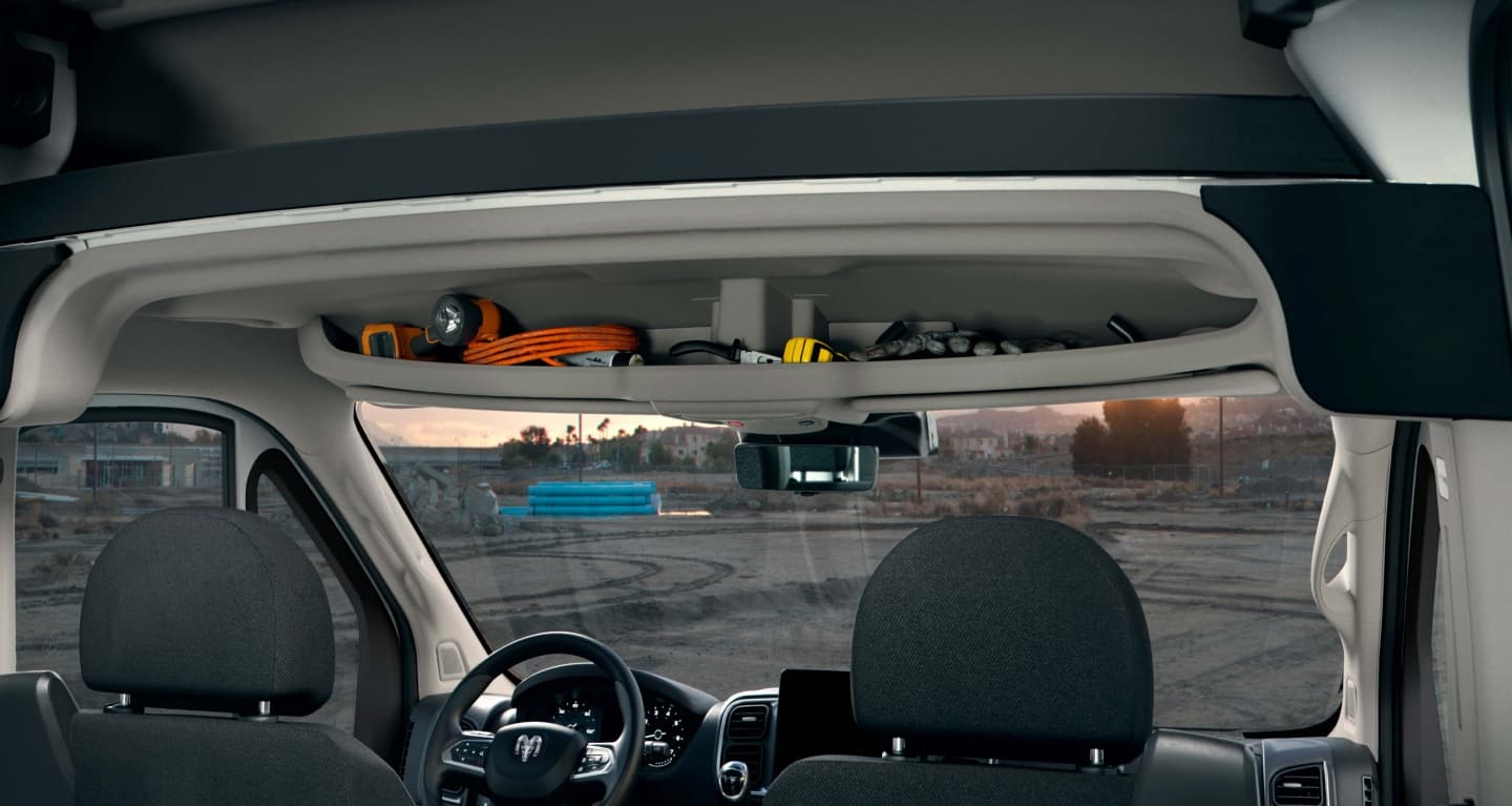 Display The windshield and full-length headliner storage compartment in the 2027 Ram ProMaster Cargo Van.