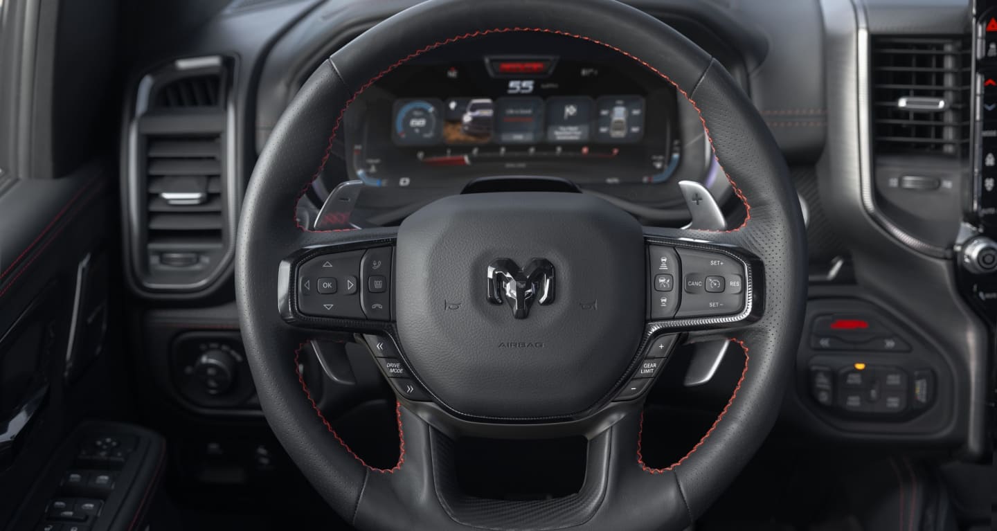 Display The steering wheel in the 2027 Ram 1500 RHO 4x4 Crew Cab.