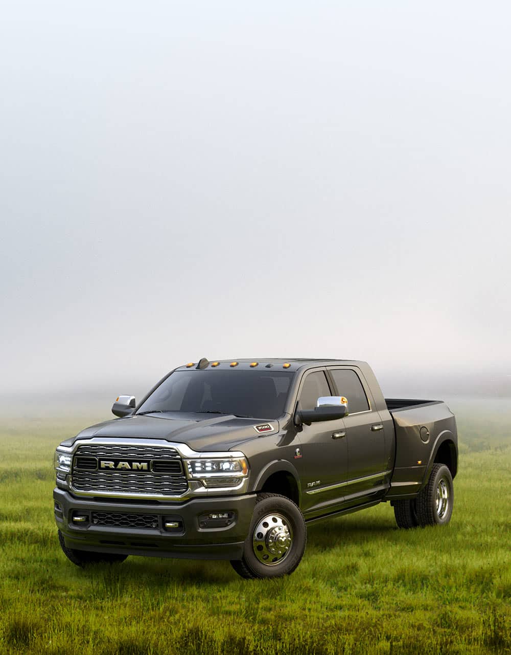 The 2019 Ram 3500 Limited parked on a hill.
