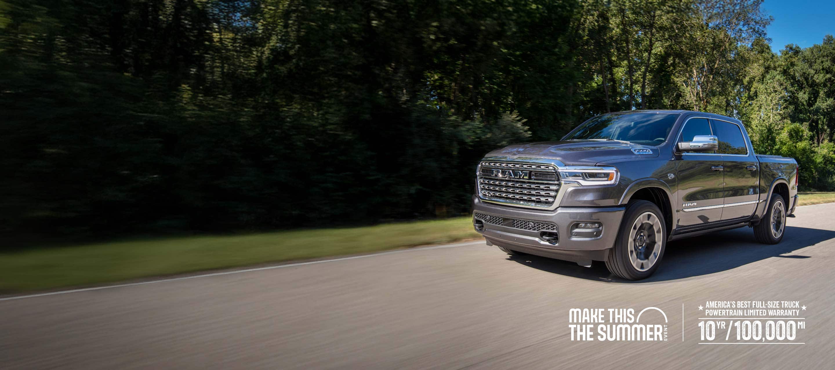 A gray 2026 Ram 1500 Limited 4x4 Crew Cab traveling down a country road. Make this the Summer Event and 10YR/100000mi.