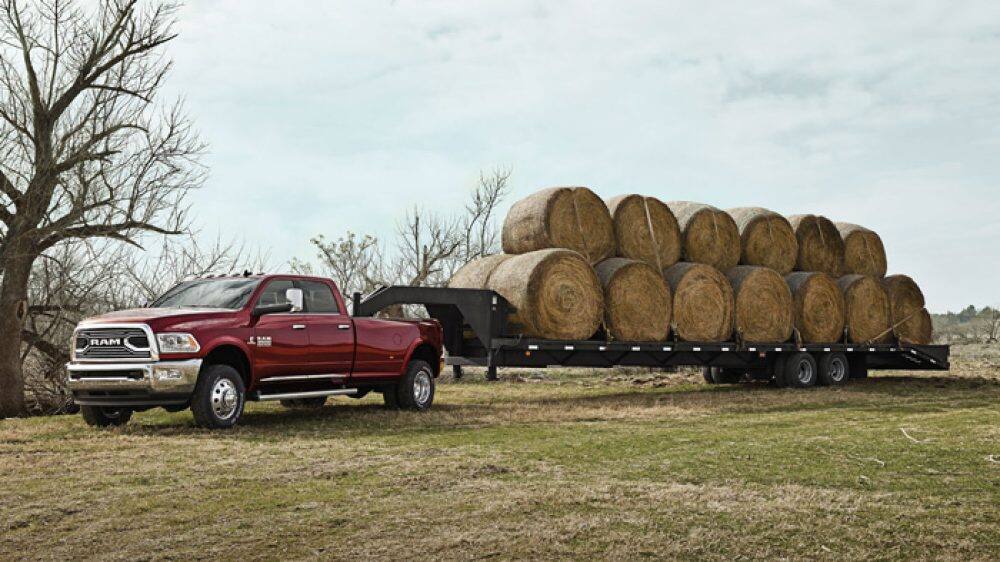 Ram 3500 dually hauling hay