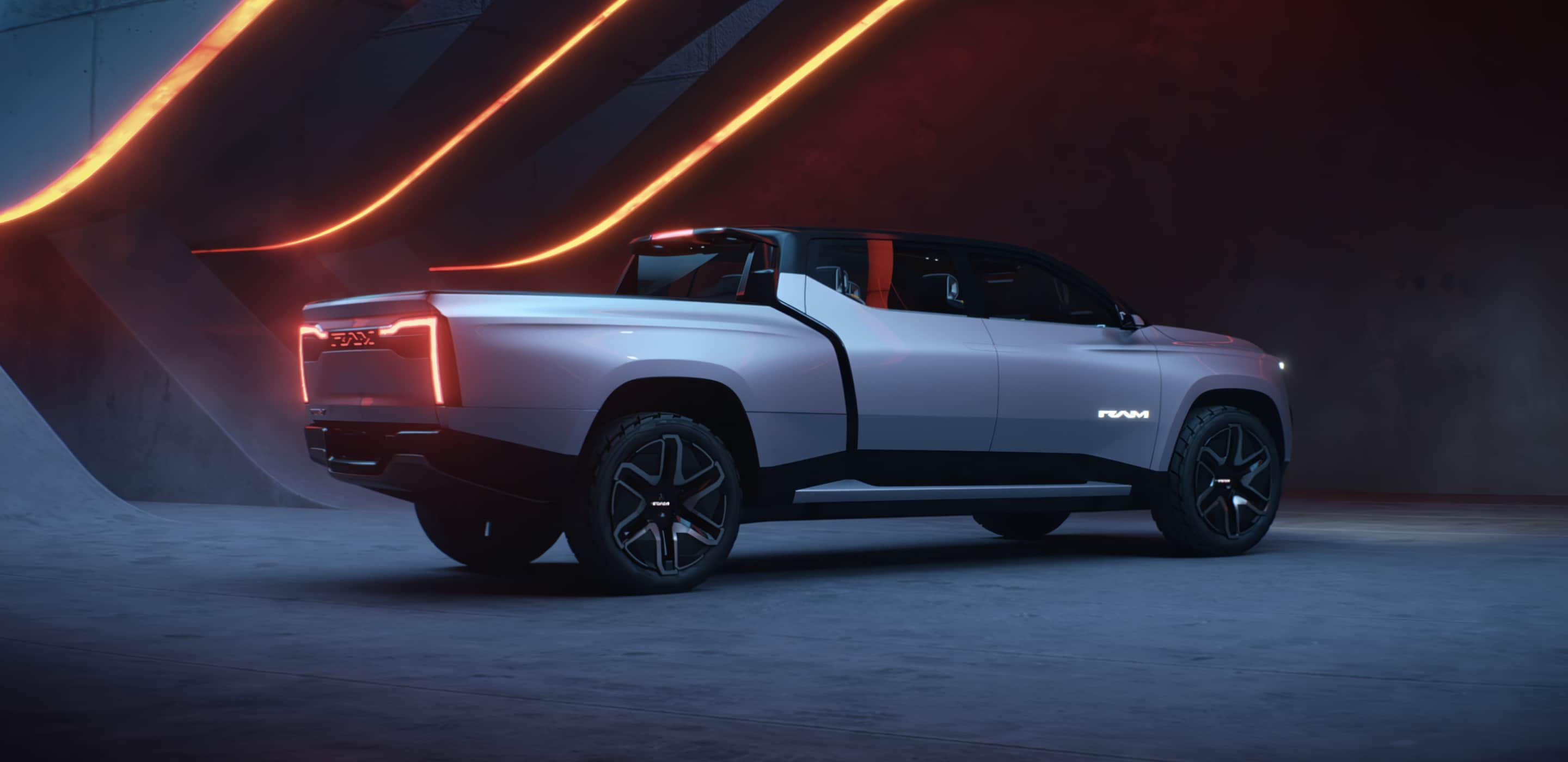 Display An angled passenger-side profile of the Ram Revolution Concept in a studio with a dramatic set design.